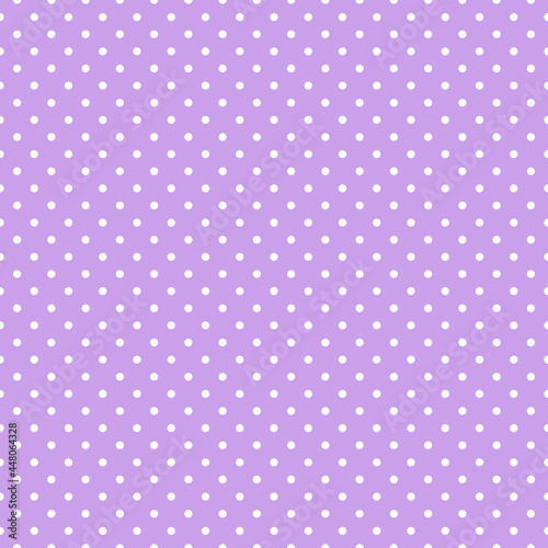 Seamless polka dots pattern. White small dots on a beautiful lilac background.