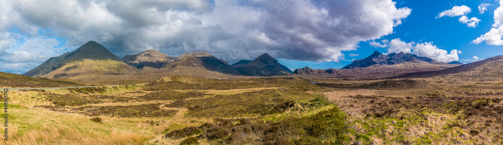 A panorama view across the unspoilt landscape of Isle of Skye towards the distant Cuillin Hills, Scotland on a summers day