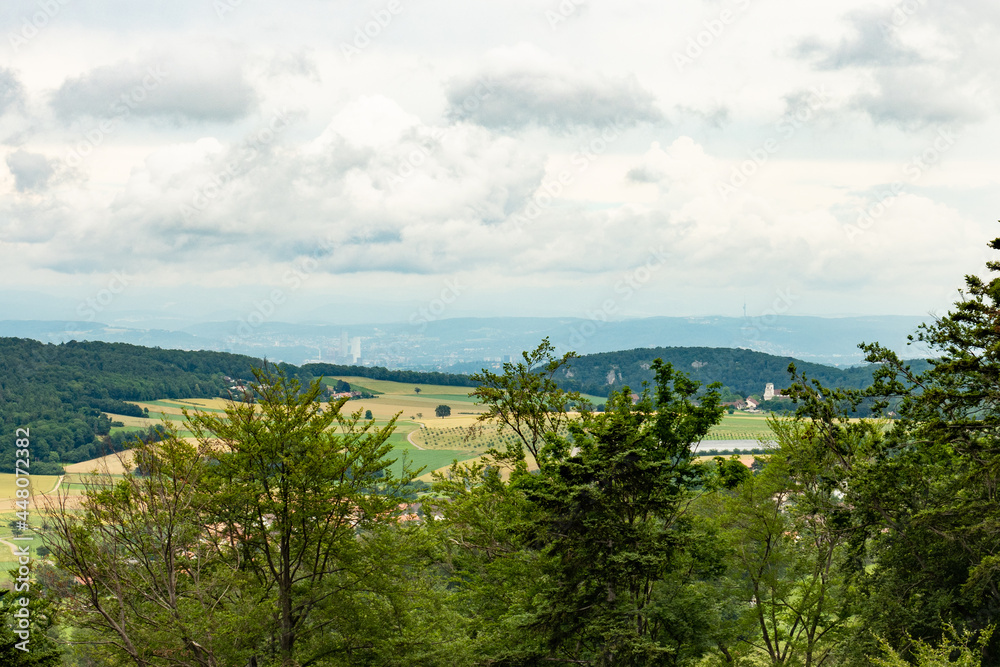 View from the Jura hills towards over the cloister Mariastein towards Basel city, Switzerland