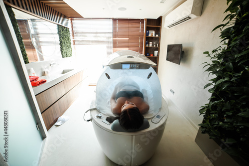 Modern capsule for hydrotherapy in a beauty salon for women
 photo