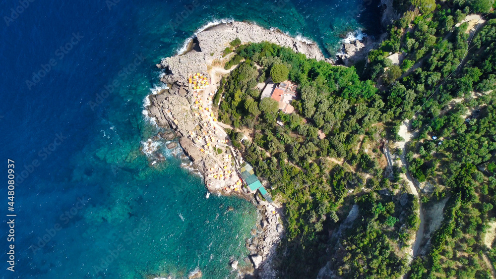 Face like shape in Amalfi coast from Punta Campanella near Sorrento. Amazing aerial view from drone in summer season.