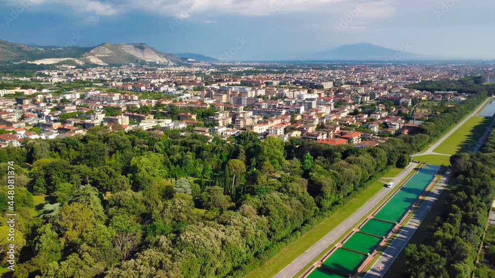 Reggia di Caserta, Italy. Aerial view of famous royal building gardens from a drone in summer season.