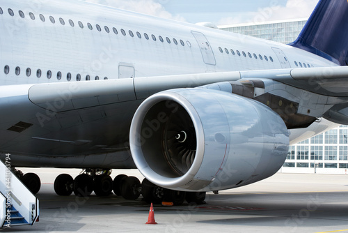 A close up view of aircraft's turbine at airport.