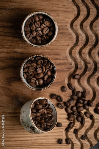 coffee beans in sticks on a wooden board. High quality photo