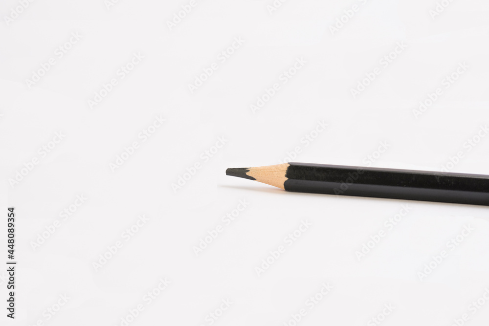 Black pencil isolated on white background. Black pencil isolated on white background.