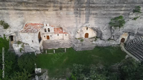 Aerial view of an Ancient chapel in a cave. Ojo Guarena, Burgos. Spain. High quality 4k footage. photo