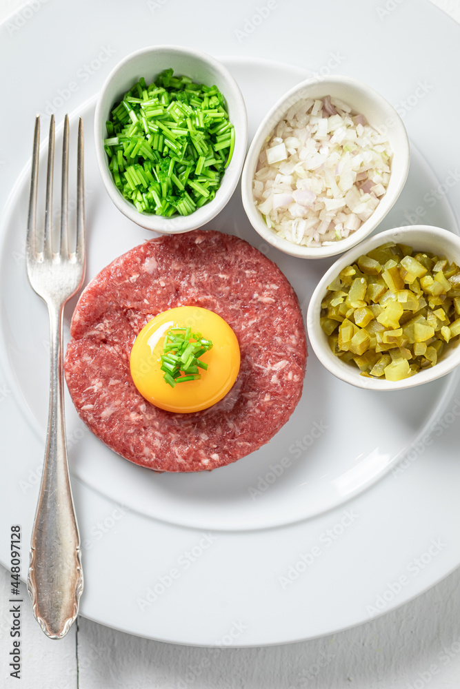 Delicious beef tartare with pepper and oil. Full of protein.