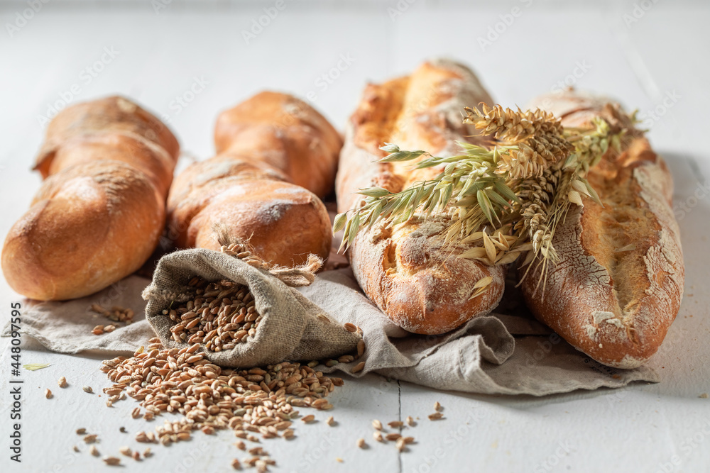Homemade baguettes made of whole grains. Country kitchen or bakery. Homemade baguettes made of whole grains. Country kitchen or bakery.