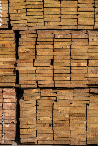 Stack of treated lumber for home building