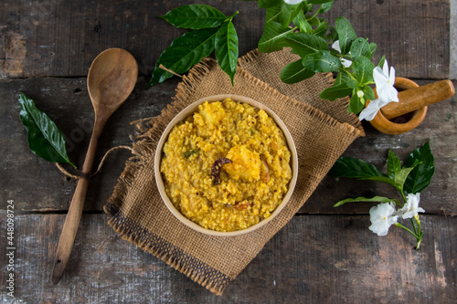 Bengali dish khichdi or khichuri made from a combination of lentils and rice along with Indian spices. Ready to eat food. Close up. photo