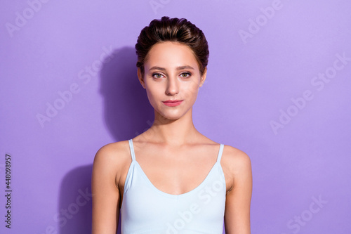 Photo portrait girl with bob hairstyle in blue top isolated pastel violet color background