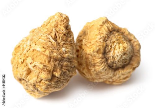 Dried maca roots isolated on white background photo