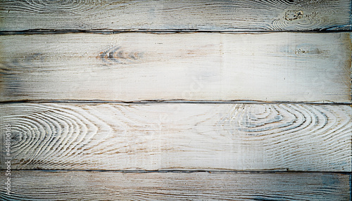 Planks of an old barn wooden horizontal gray background close-up