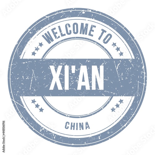 WELCOME TO XI'AN - CHINA, words written on gray stamp