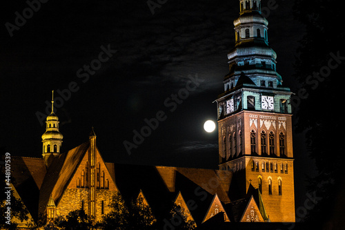 A beautiful church and the moon. Beautiful architecture. Night scene. Background.