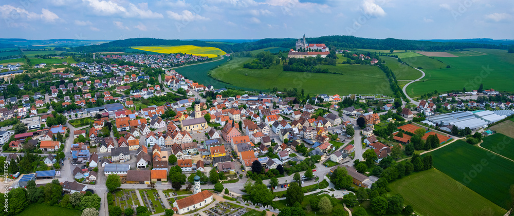 Aerial view of the city and monastery Neresheim in Germany, Bavaria on a sunny day in Spring