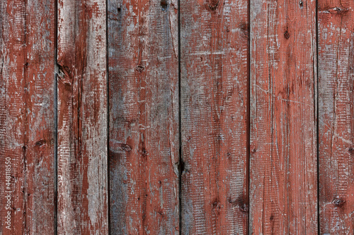Old red brown weathered color planks. Painted wood texture. Vintage authentic painted wooden planks. Wood and oil paint. Country texture. Wallpaper. Material for designers and decorators.