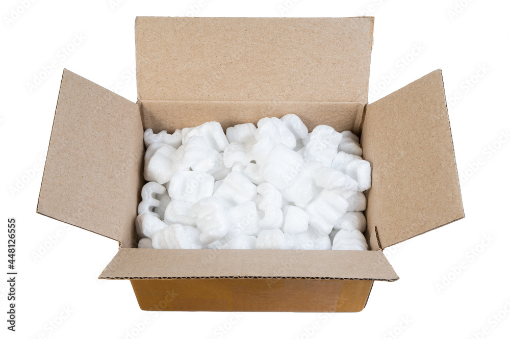 Closeup white polystyrene foam in parcel box. Polystyrene foam