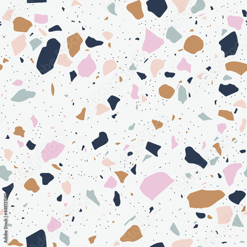 Seamless vector pattern.
Pink, blue and brown terrazzo texture. Geometric tiles background with different stones shapes and size.