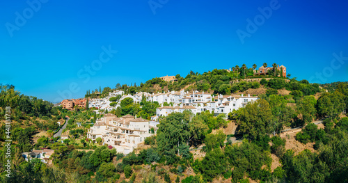 Benahavis In Malaga, Andalusia, Spain. Summer Cityscape. Village With Whitewashed Houses photo