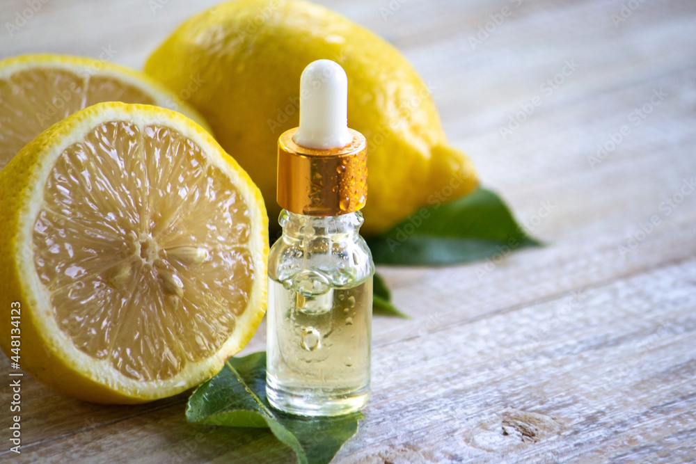 A bottle of lemon essential oil is an alternative medicine. A bottle of lemon essential oil is an alternative medicine.