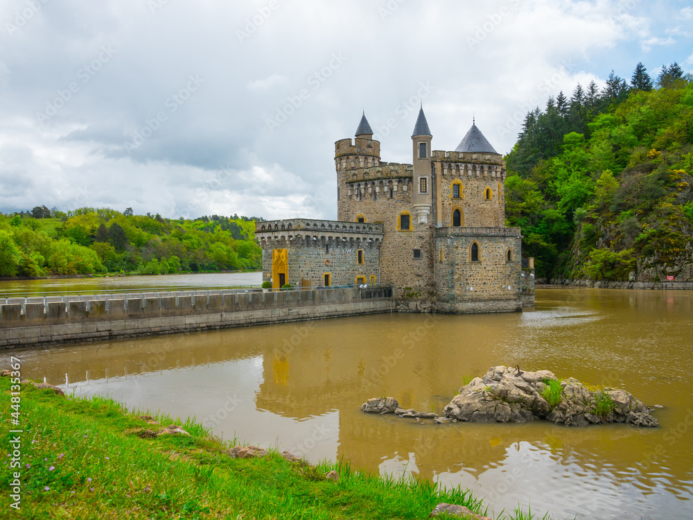 The Historic Chateau de la Roche sitting proudly in the Loire River, Rhone Valley France.