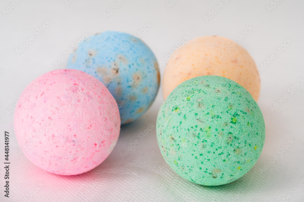 bathroom bombs green, pink, cream and blue on a white background bathroom bombs green, pink, cream and blue on a white background