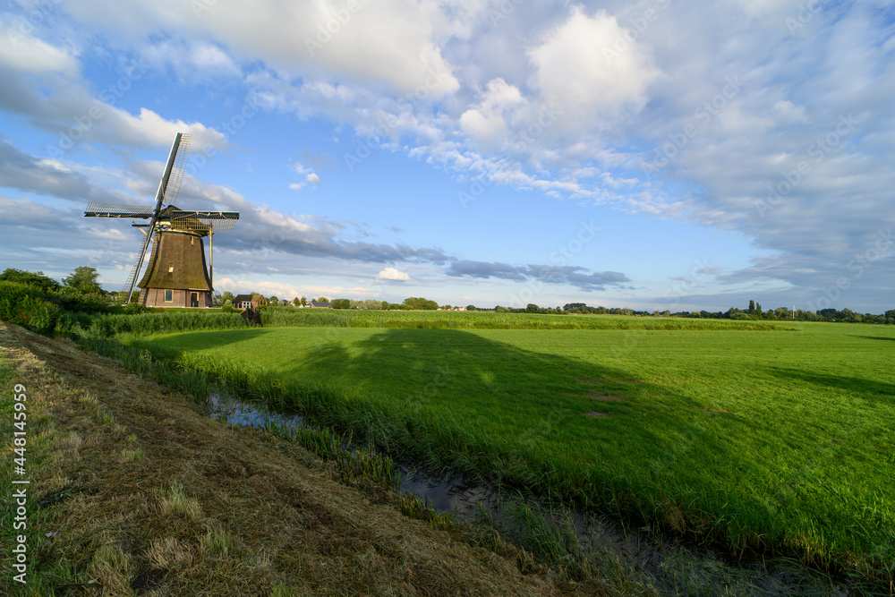 A traditional dutch windmill near Vreeland, The Netherlands A traditional dutch windmill near Vreeland, The Netherlands