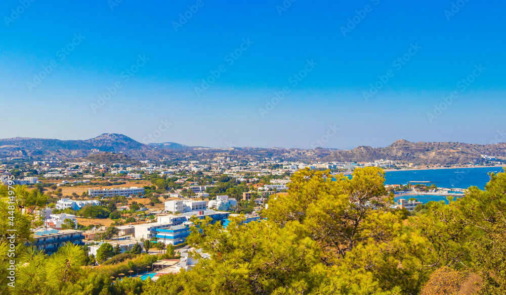 Faliraki seascape town and mountain landscape panorama Rhodes Greece.