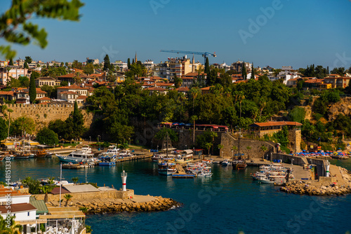 ANTALYA, TURKEY: Top view of the old harbor and the pier for tourist boats and pirate ships in the port in Antalya.