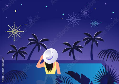 A woman in the pool at night.