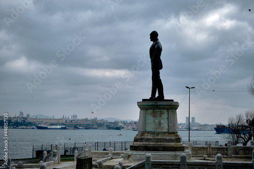 Turkey istanbul 04.03.2021. Ataturk founder of Turkish republic sculpture in Sarayburnu istanbul during overcast weather and bosporus istanbul background.