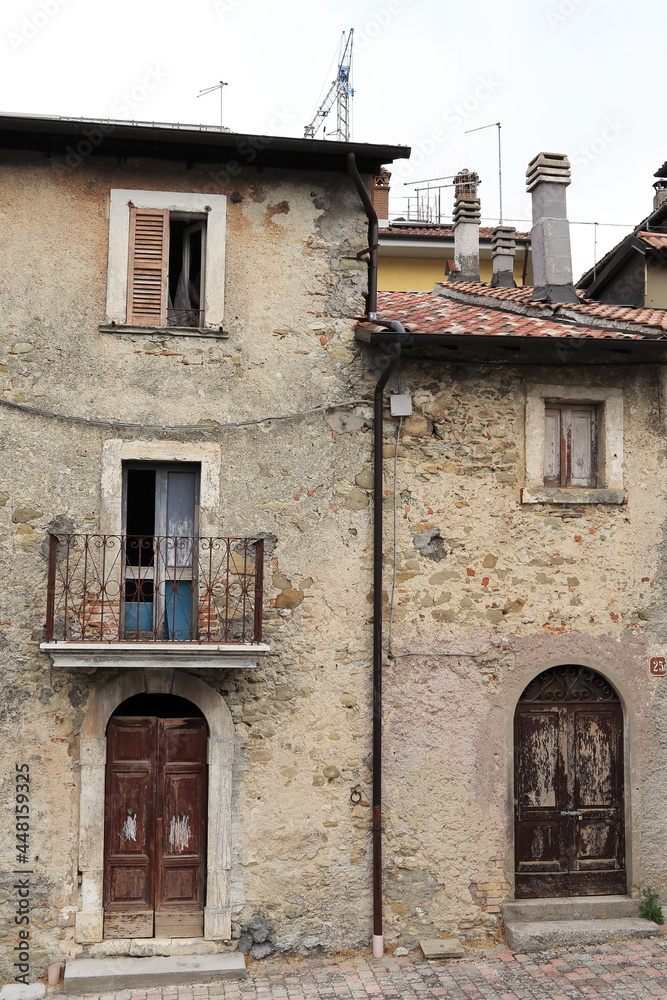 Central Italy Rural Village Old House Facades with Wooden Doors, Chimneys and Iron Balcony