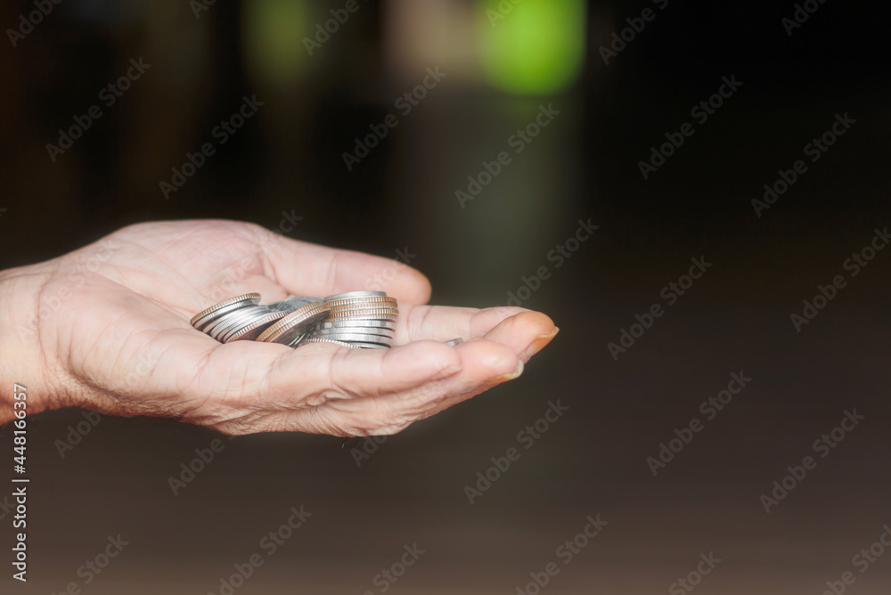 A handful of coins in the  hand
