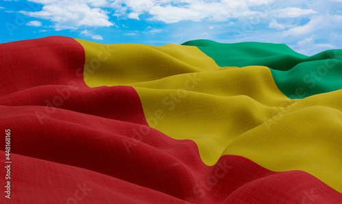 Guinea flag in the wind. Realistic and wavy fabric flag. 3D rendering.