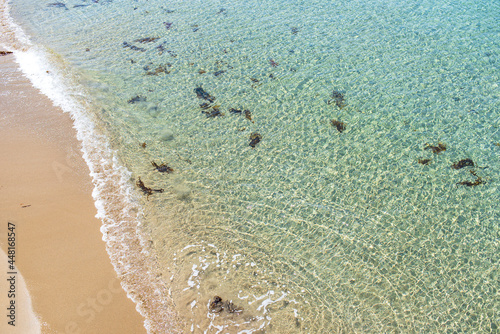 Sparkling clear water and sandy beaches.