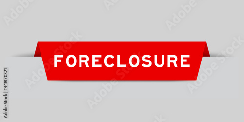 Red color inserted label with word foreclosure on gray background