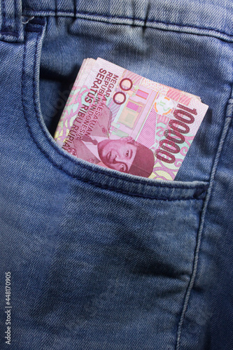 rupiah money inside of jeans pocket indonesia currency