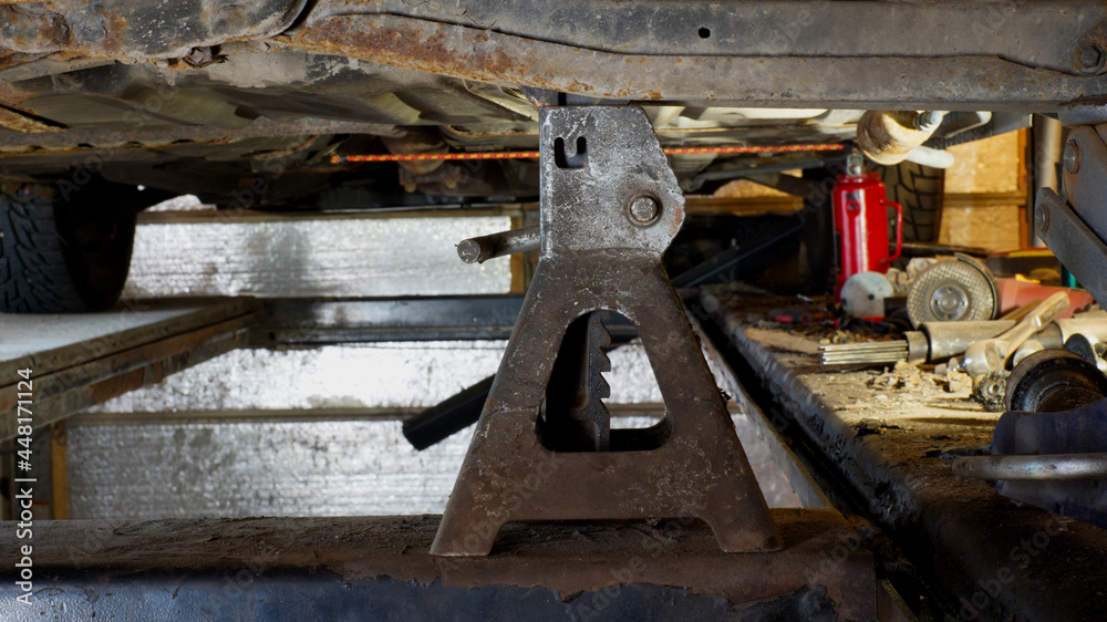 A Jack Stand Supporting a Vehicle