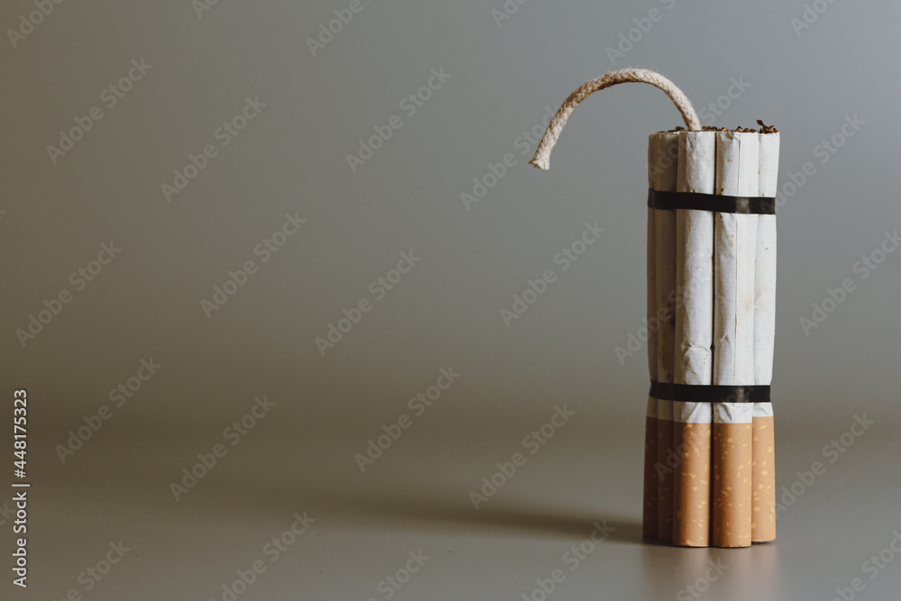 Cigarette like time bomb.Cigarettes is addictive to be cancer.smoking reduction campaign in World No Tobacco Day. Cigarette like time bomb.Cigarettes is addictive to be cancer.smoking reduction campaign in World No Tobacco Day.