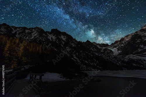 Fototapeta Naklejka Na Ścianę i Meble -  Bright starry sky with the milky way on the background of High Tatras mountains