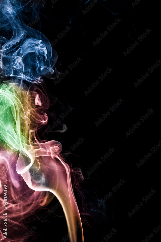 Obraz premium Colorful smoke on black background.