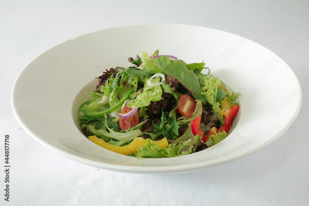 season green vegetables with salad dressing sauce appetiser in white background Christmas festival menu season green vegetables with salad dressing sauce appetiser in white background Christmas festival menu