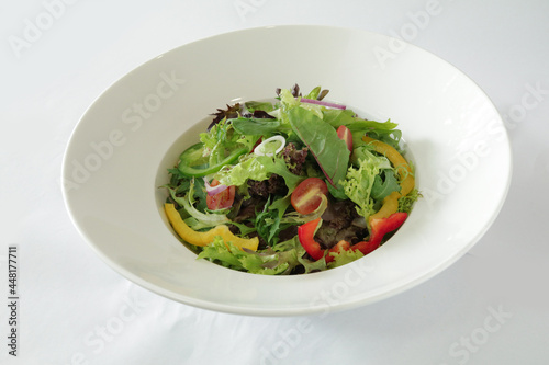 season green vegetables with salad dressing sauce appetiser in white background Christmas festival menu