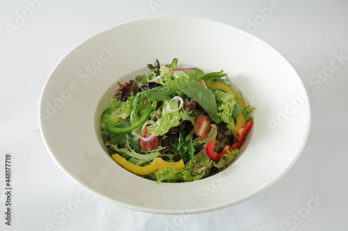 season green vegetables with salad dressing sauce appetiser in white background Christmas festival menu
