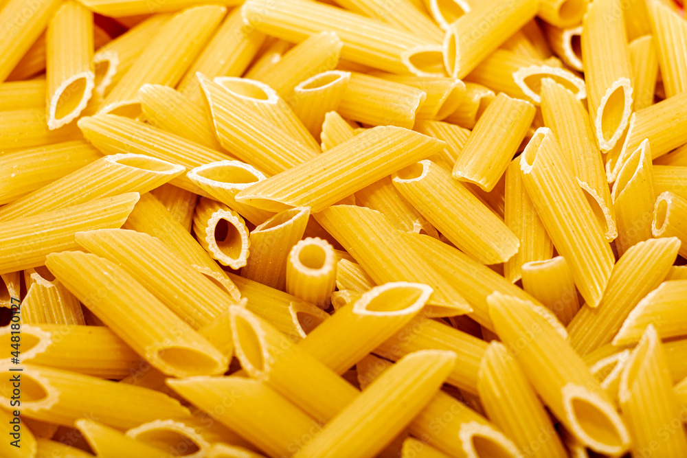 italian penne pasta fluted close - up background backdrop italian penne pasta fluted close - up background backdrop