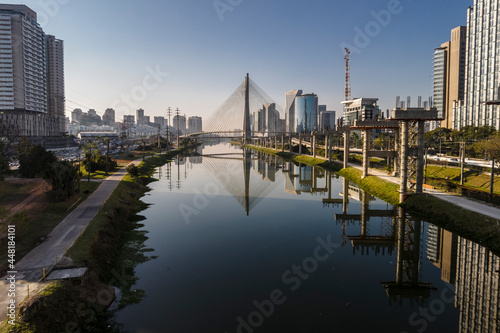 View of Pinheiros River and  the Octavio Frias de Oliveira Bridge  known as the Estaiada Bridge in background  south side of Sao Paulo  SP