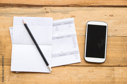 Картината върху платно saving account passbook bank ,statement due expenses of credit card and mobile p