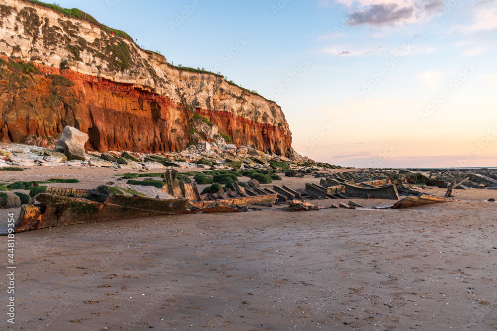 The Wreck of the Steam Trawler Sheraton in the evening light at the Hunstanton Cliffs in Norfolk, England, UK The Wreck of the Steam Trawler Sheraton in the evening light at the Hunstanton Cliffs in Norfolk, England, UK