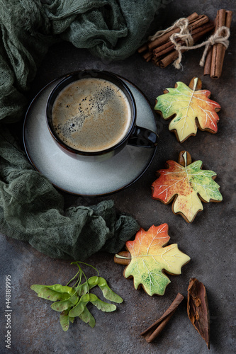 Autumn composition with coffee cup and ginger cookies, top view
